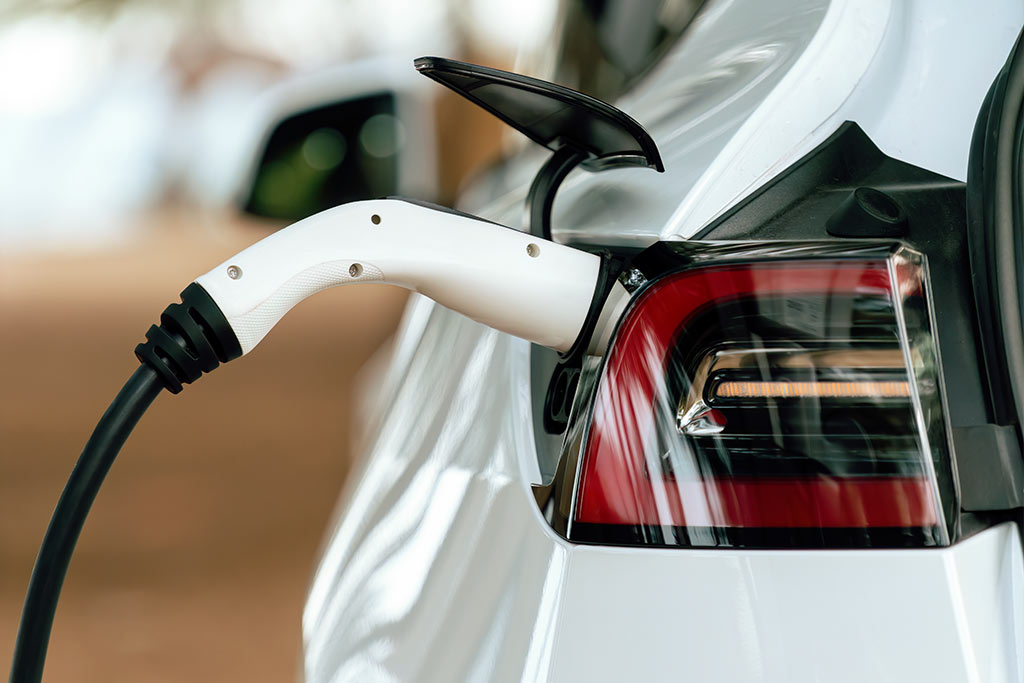 Je auto opladen tijdens parkeren